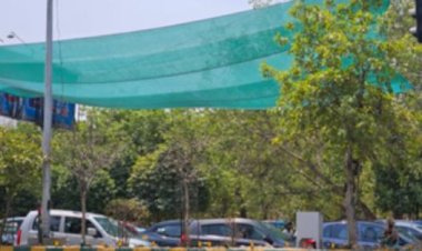 नोएडा में भी रेड लाइट पर लग रहा ग्रीन नेट, दोपहिया वाहन चालकों को तेज धूप से बचाएगा